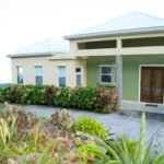 Modern single-story home with lush landscaping and ocean views in Nevis. Perfect for beachside living.